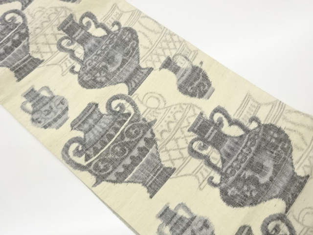 手織り紬壺模様織出し全通洒落袋帯